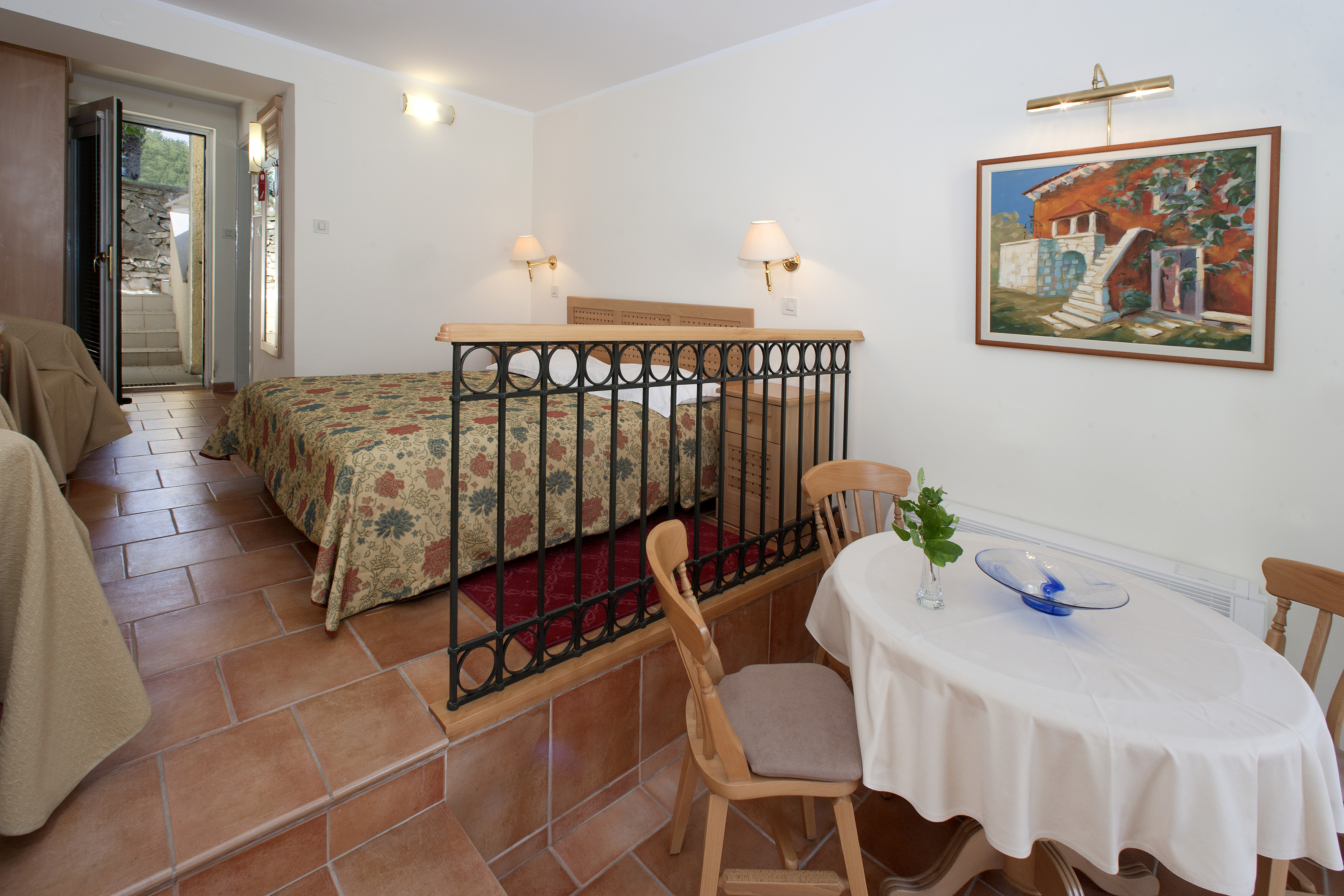 a room with a bed and a table