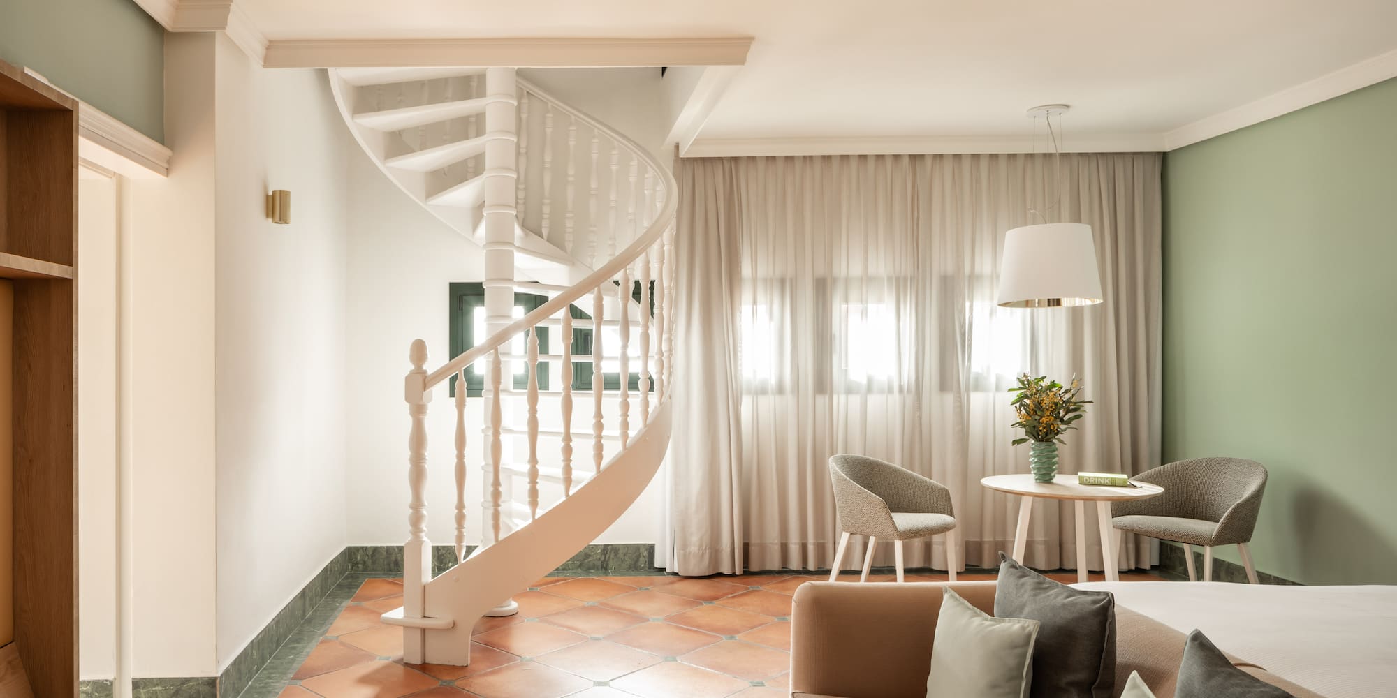 a spiral staircase in a room