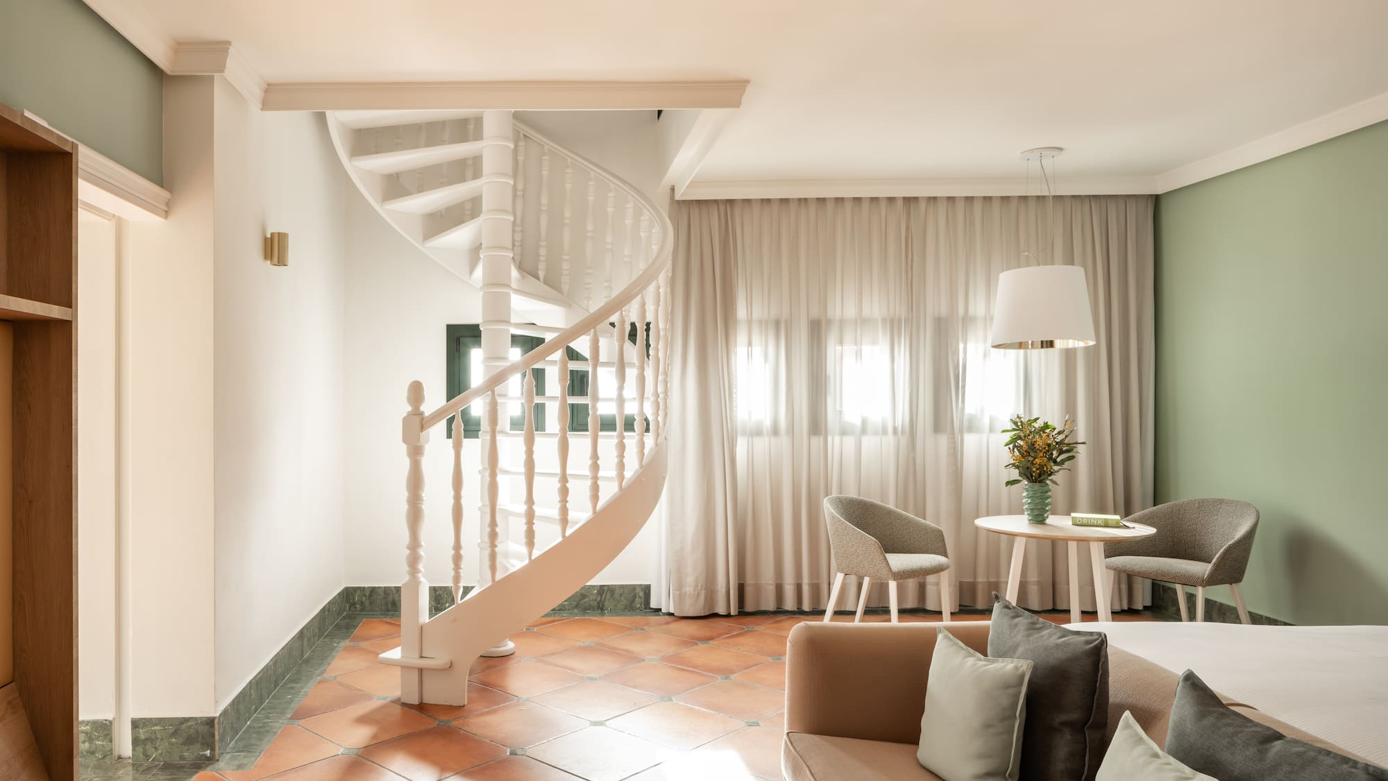 a spiral staircase in a room