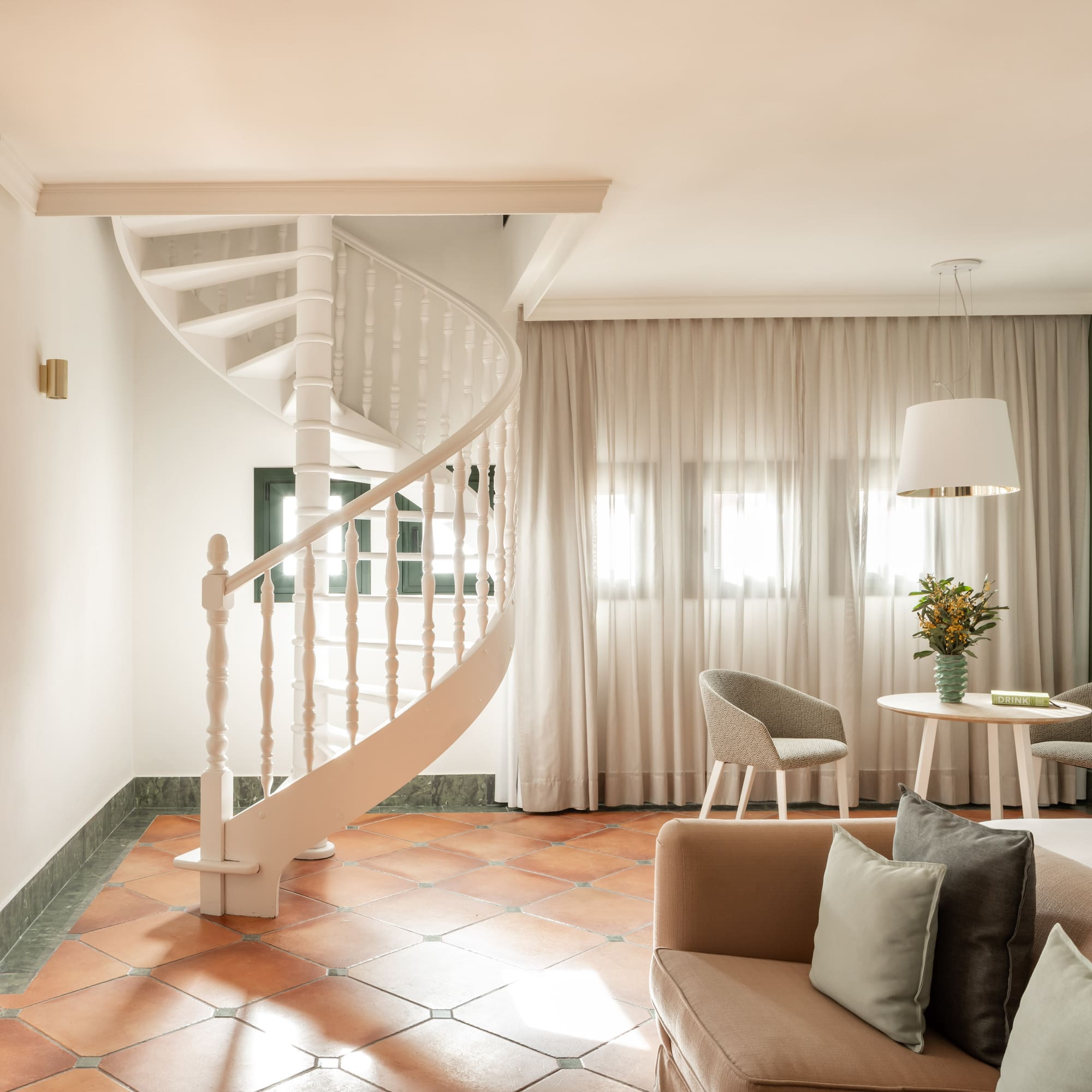 a spiral staircase in a room
