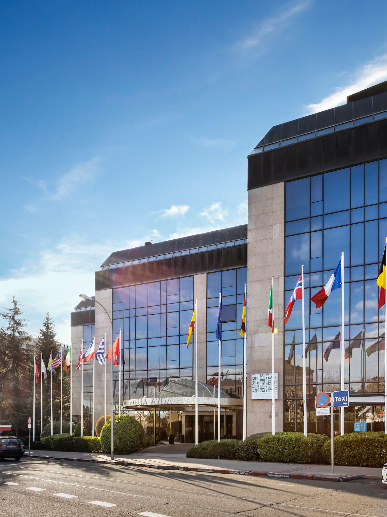 a building with flags in front of it