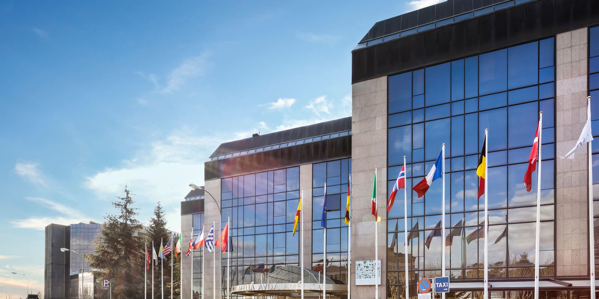 a building with flags in front of it