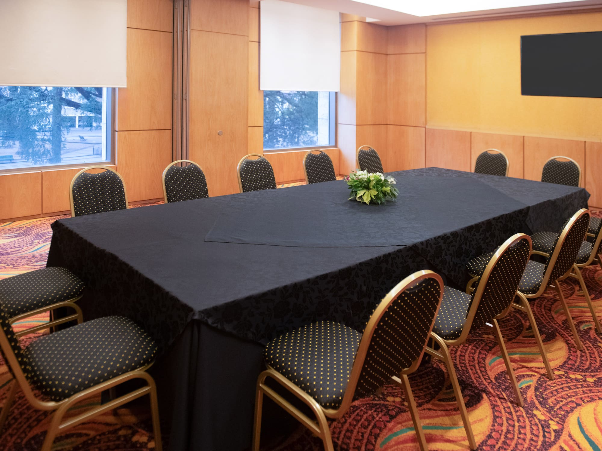 a table with chairs in a room