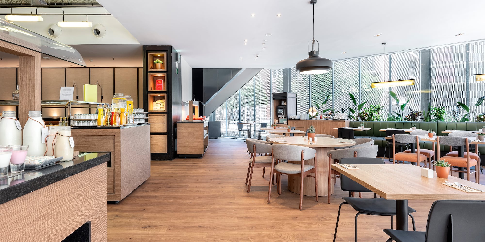 a restaurant with tables and chairs