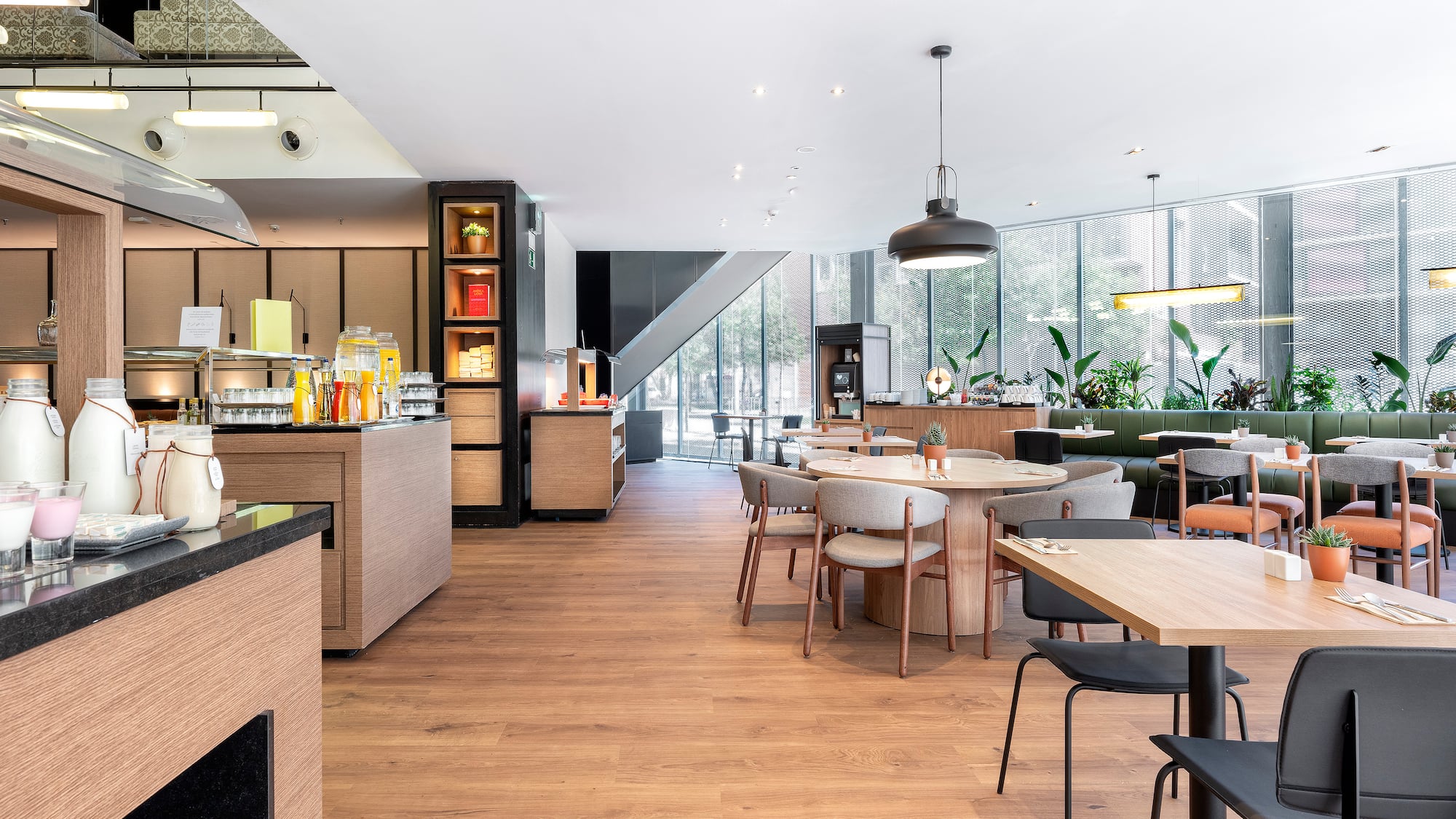 a restaurant with tables and chairs