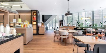 a restaurant with tables and chairs