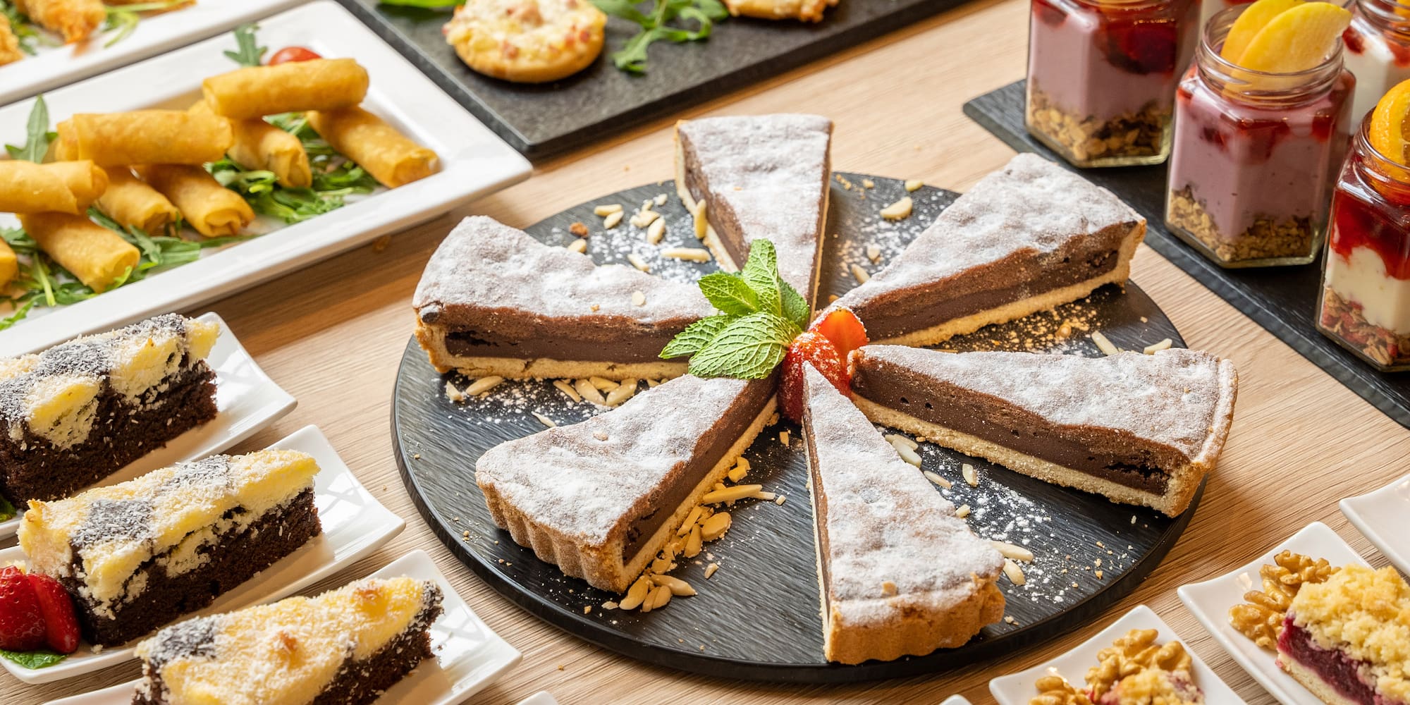 a table with different desserts