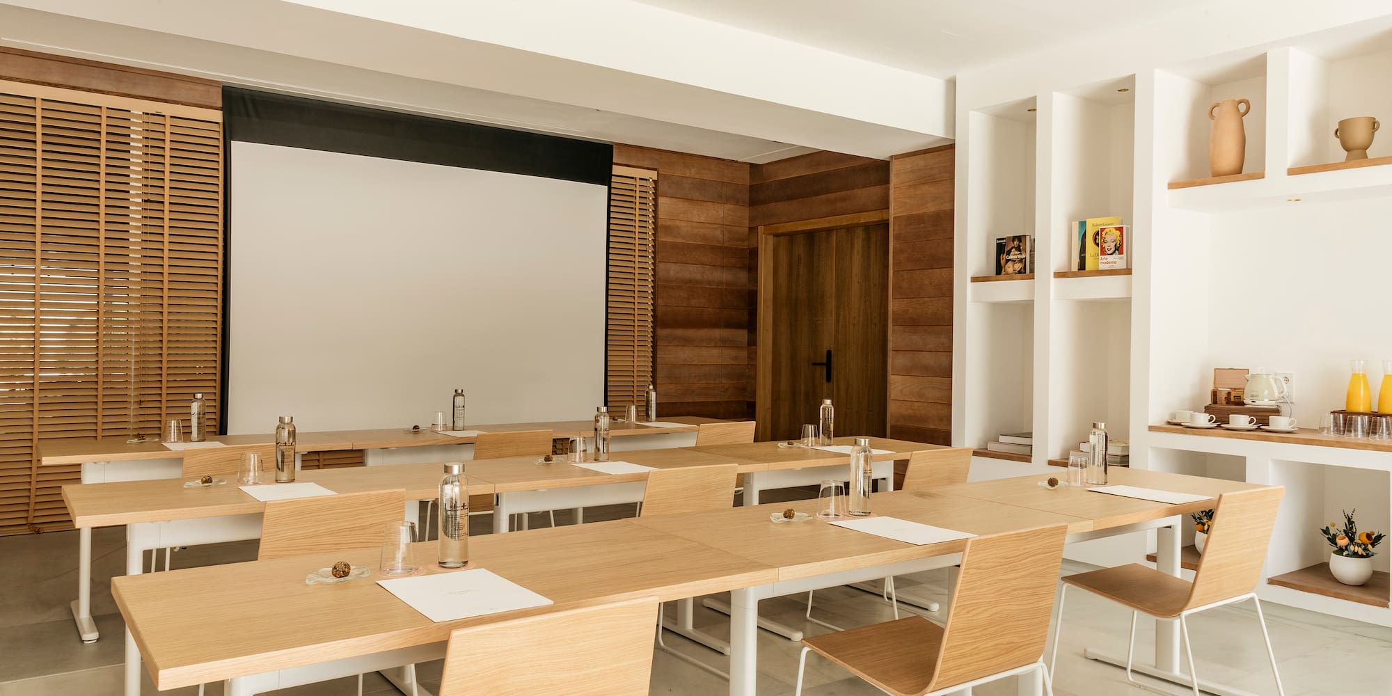 a room with tables and chairs