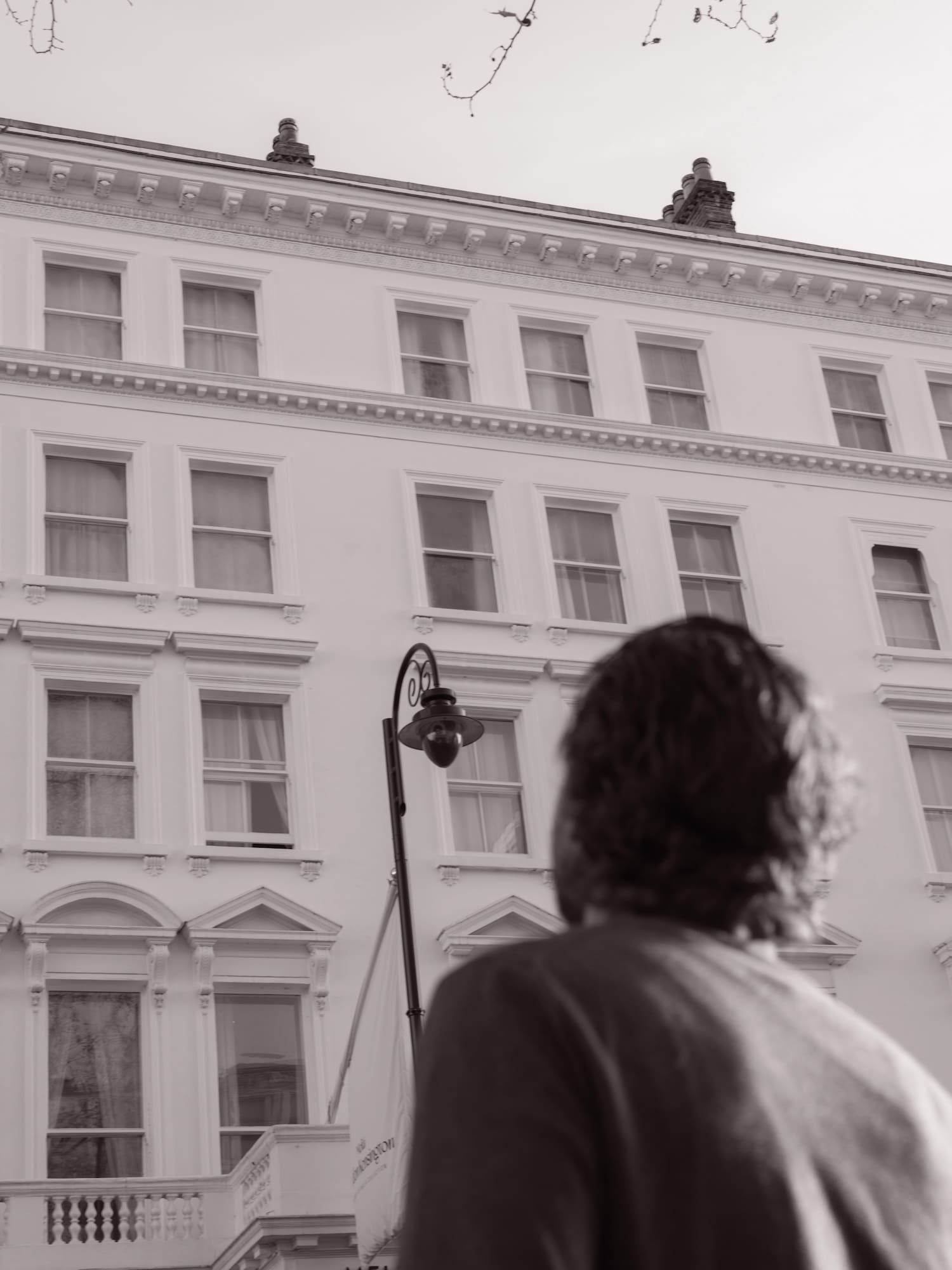 a person standing in front of a building