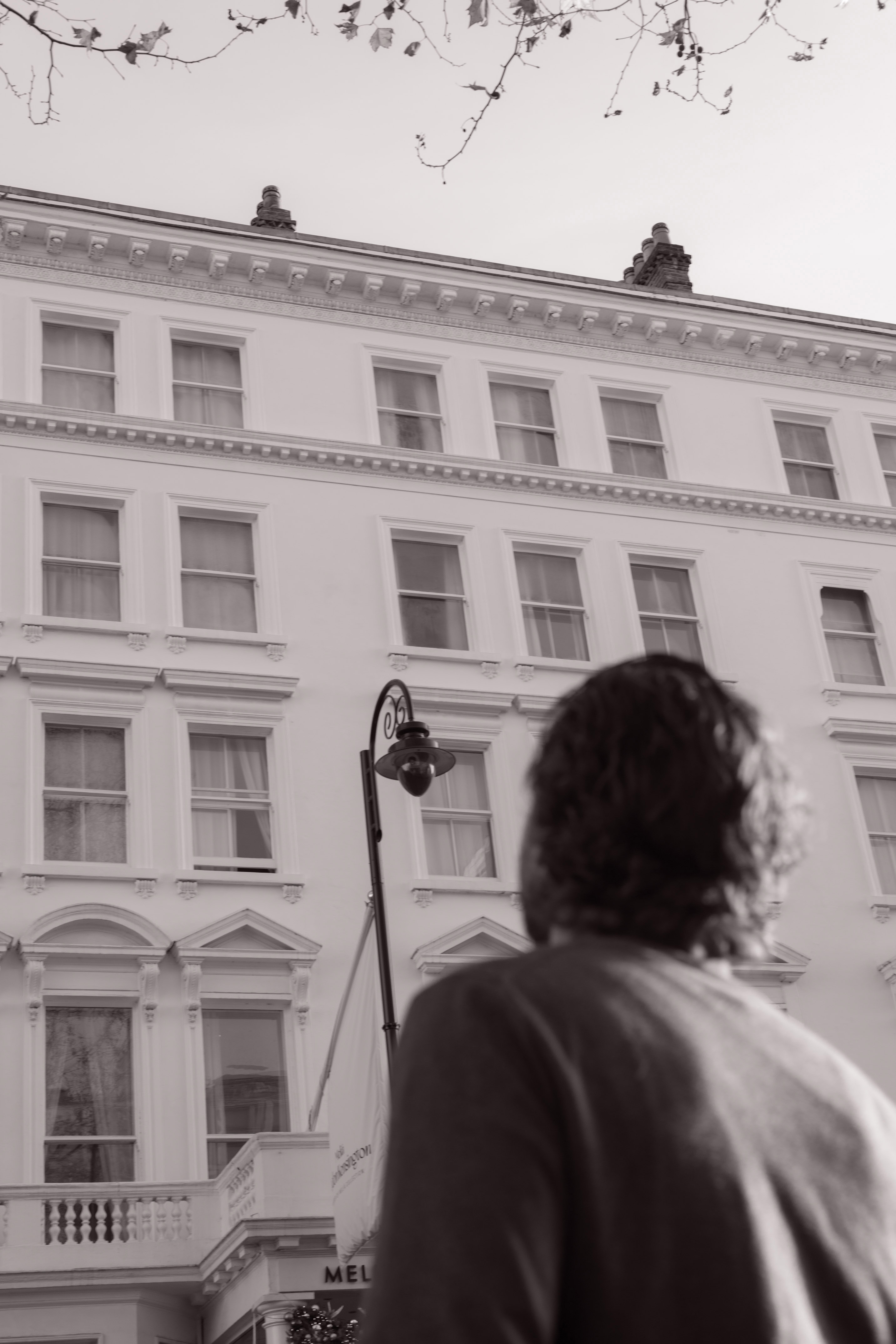 a person standing in front of a building