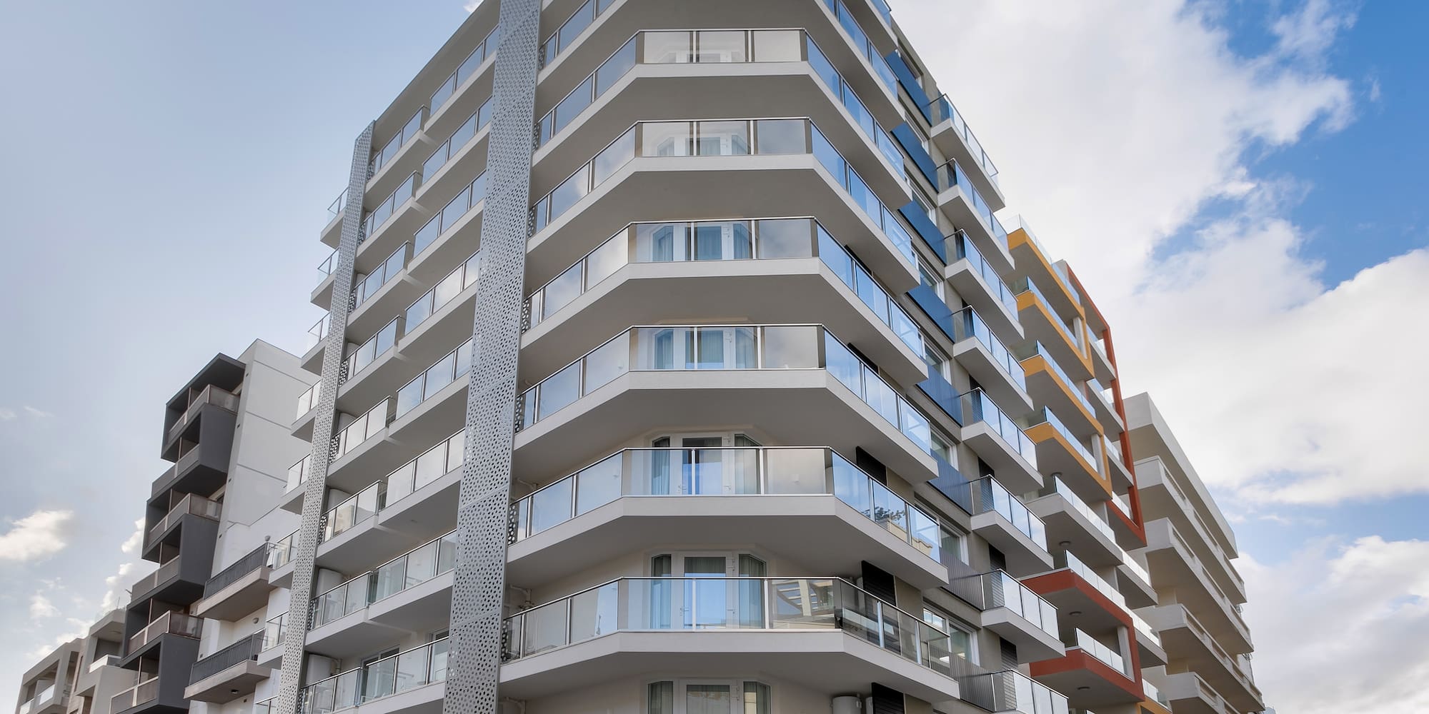 a building with balconies and windows