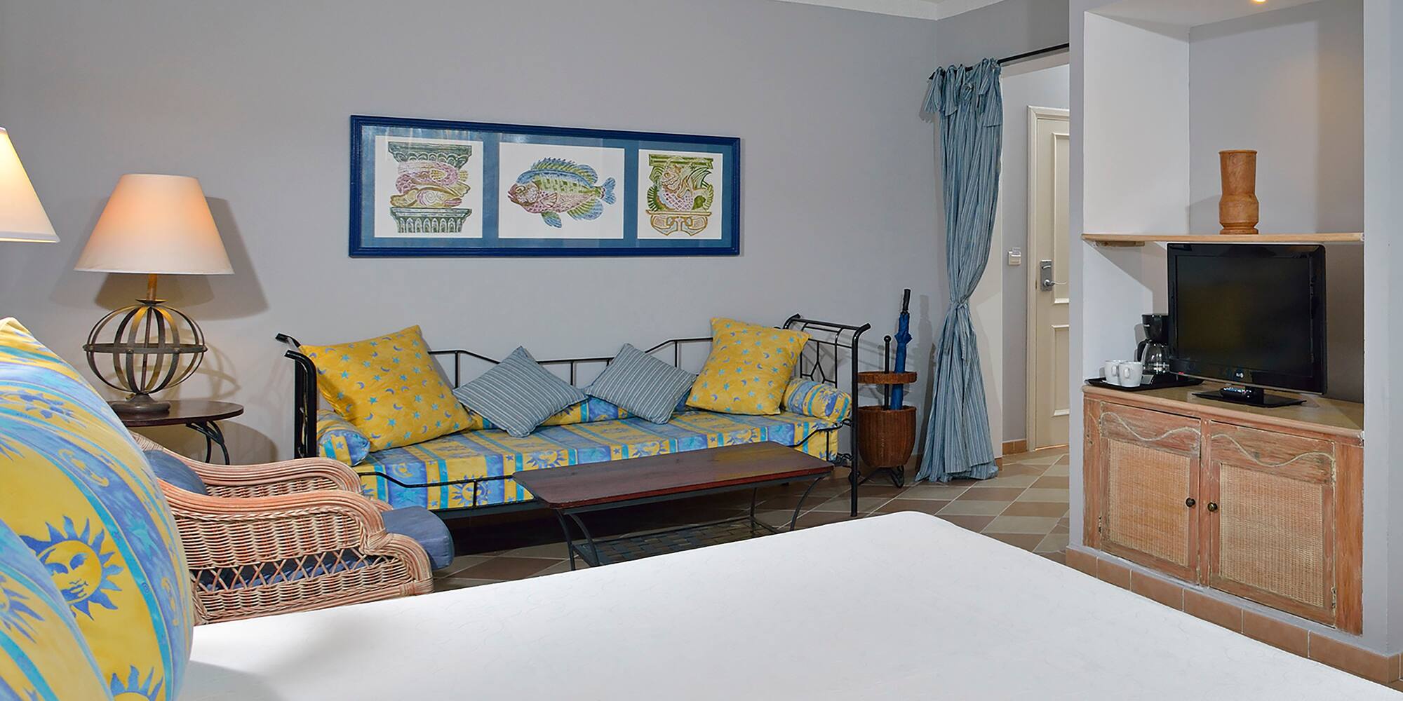 a room with a couch and a tv