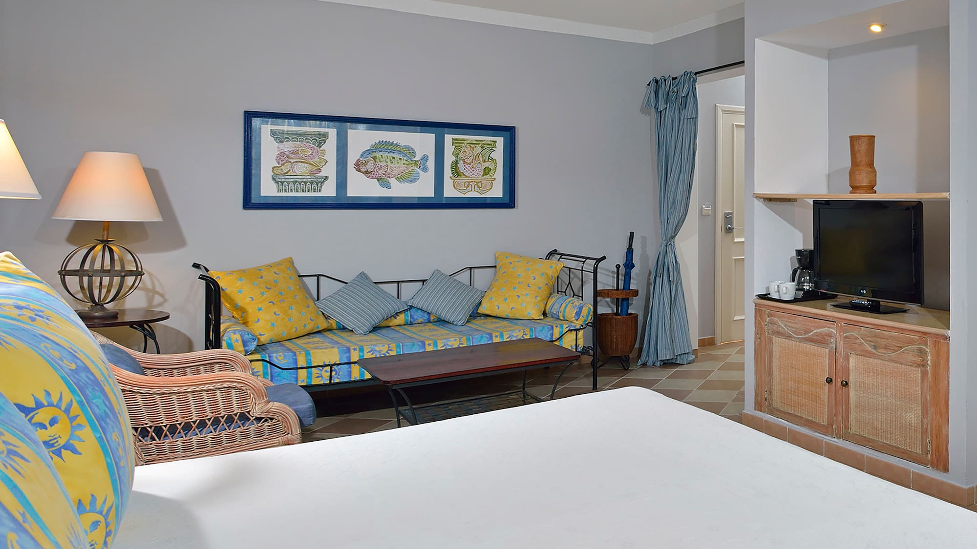 a room with a couch and a tv