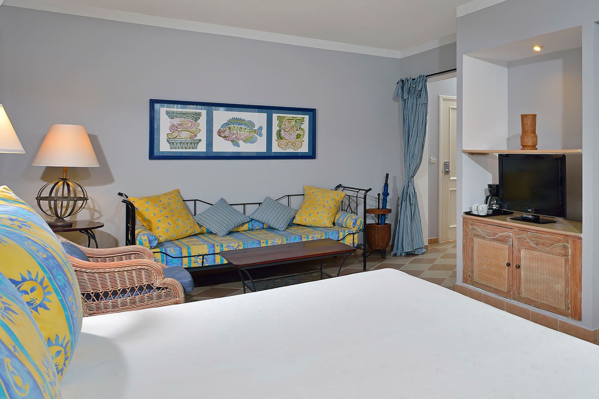 a room with a couch and a tv