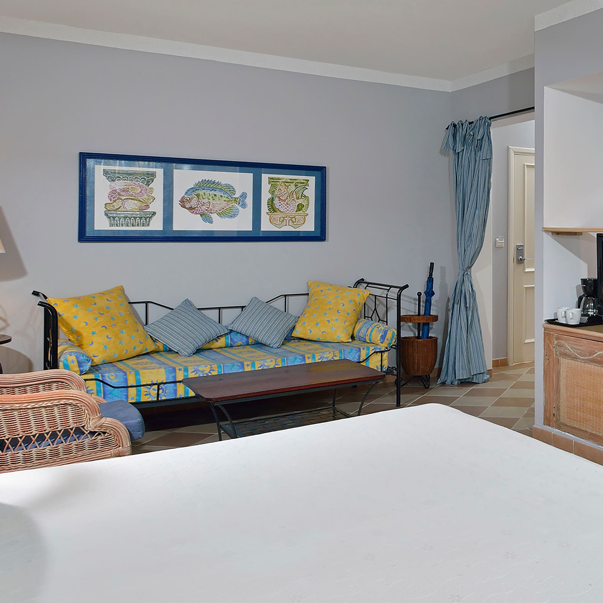 a room with a couch and a tv