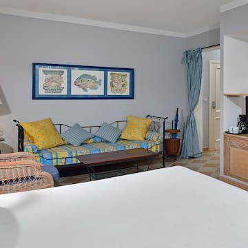 a room with a couch and a tv