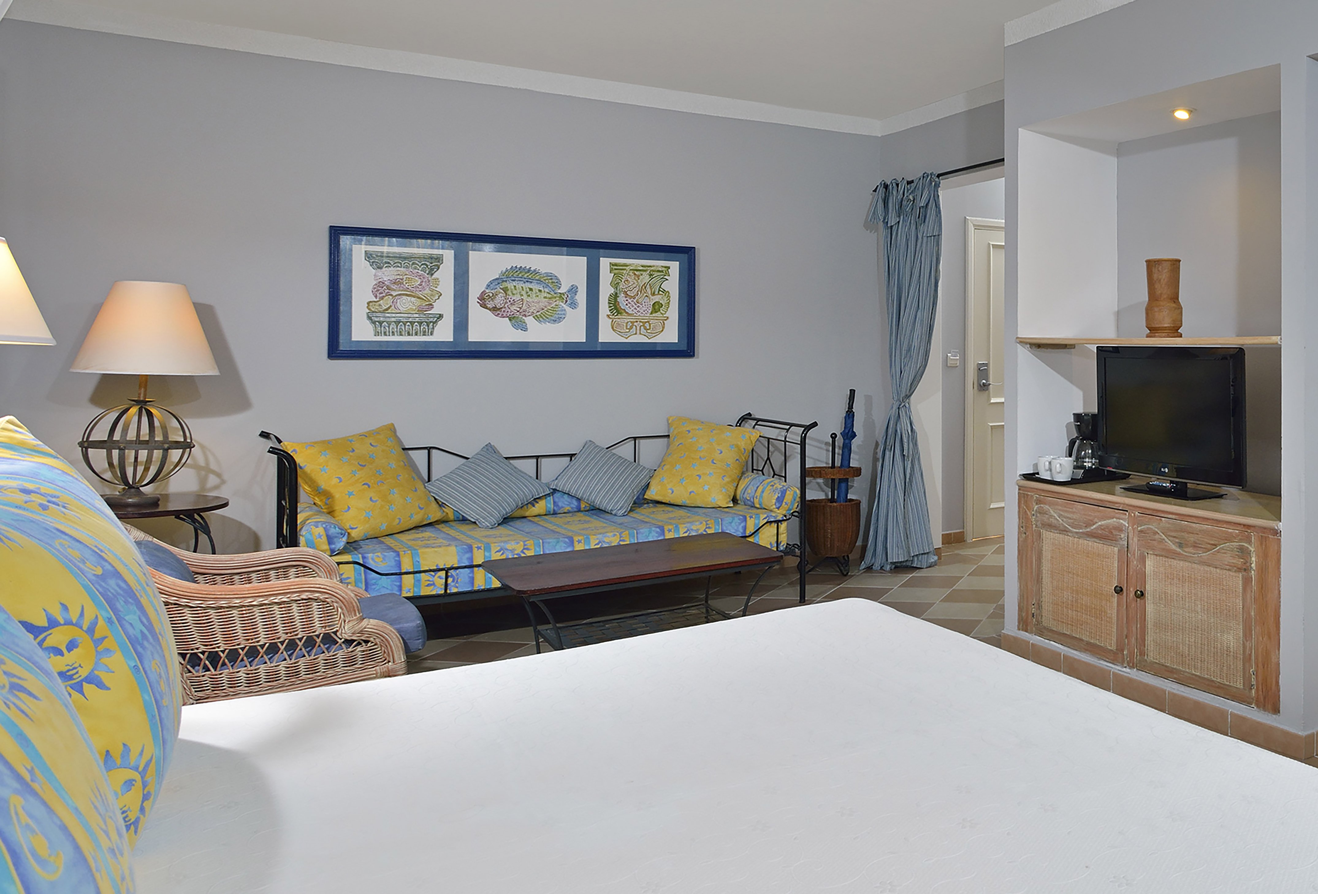 a room with a couch and a tv