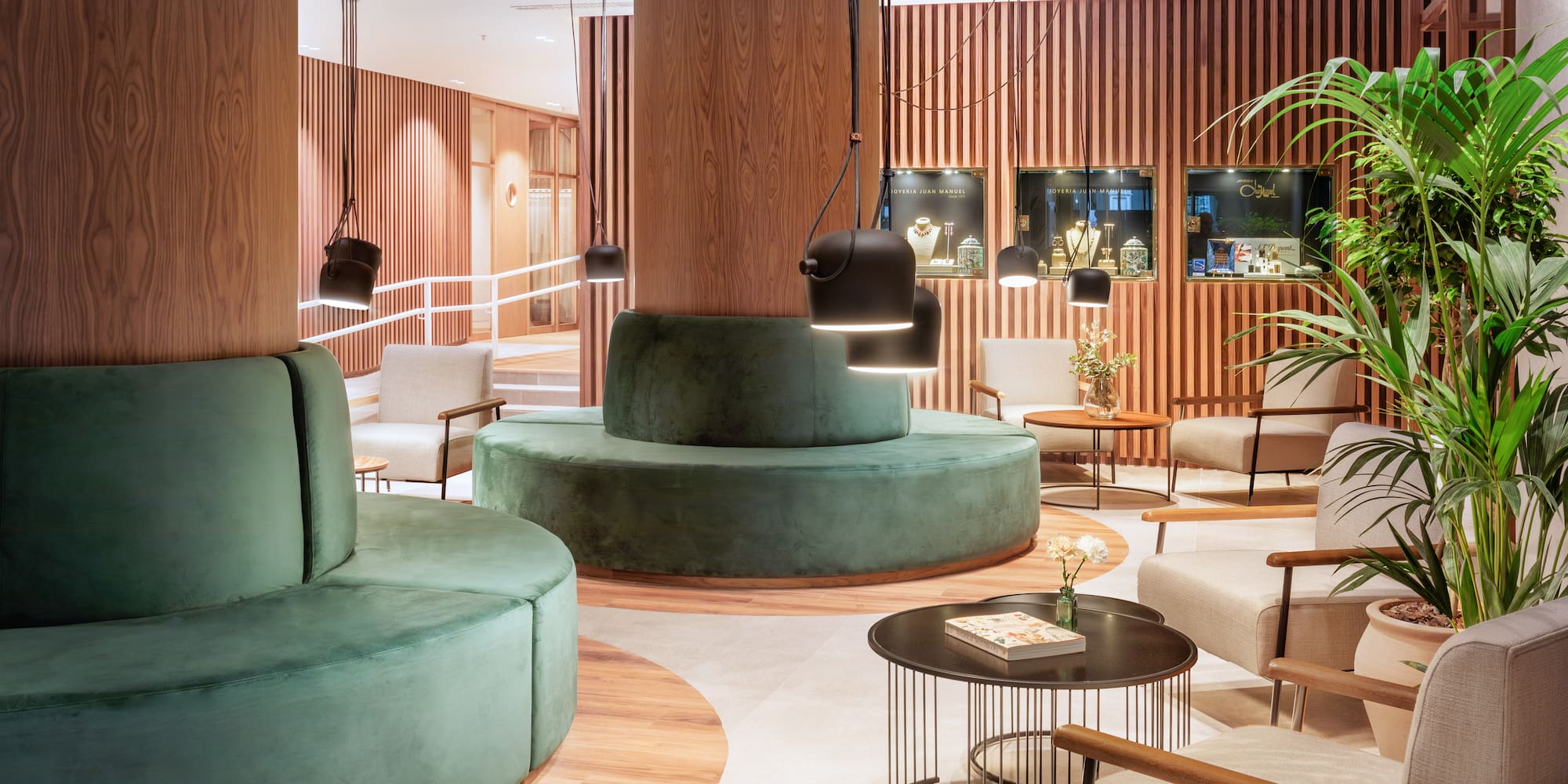 a room with a round table and chairs