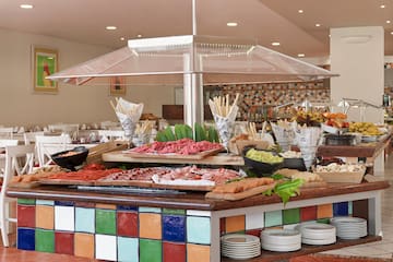 a buffet table with food on it