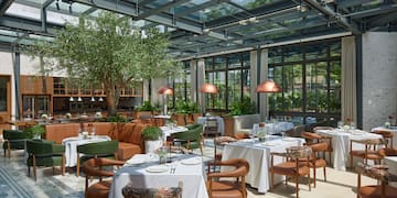 a restaurant with tables and chairs