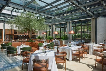 a restaurant with tables and chairs
