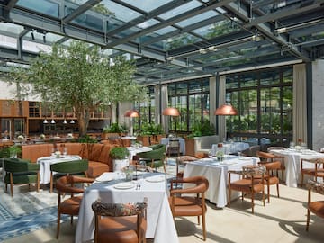 a restaurant with tables and chairs