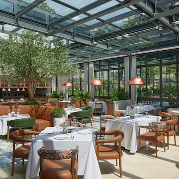 a restaurant with tables and chairs