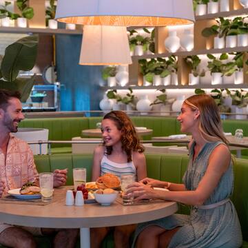 a group of people sitting at a table