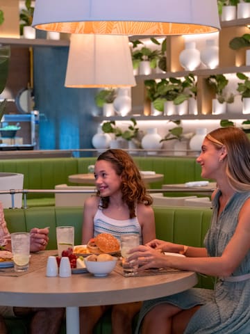 a group of people sitting at a table