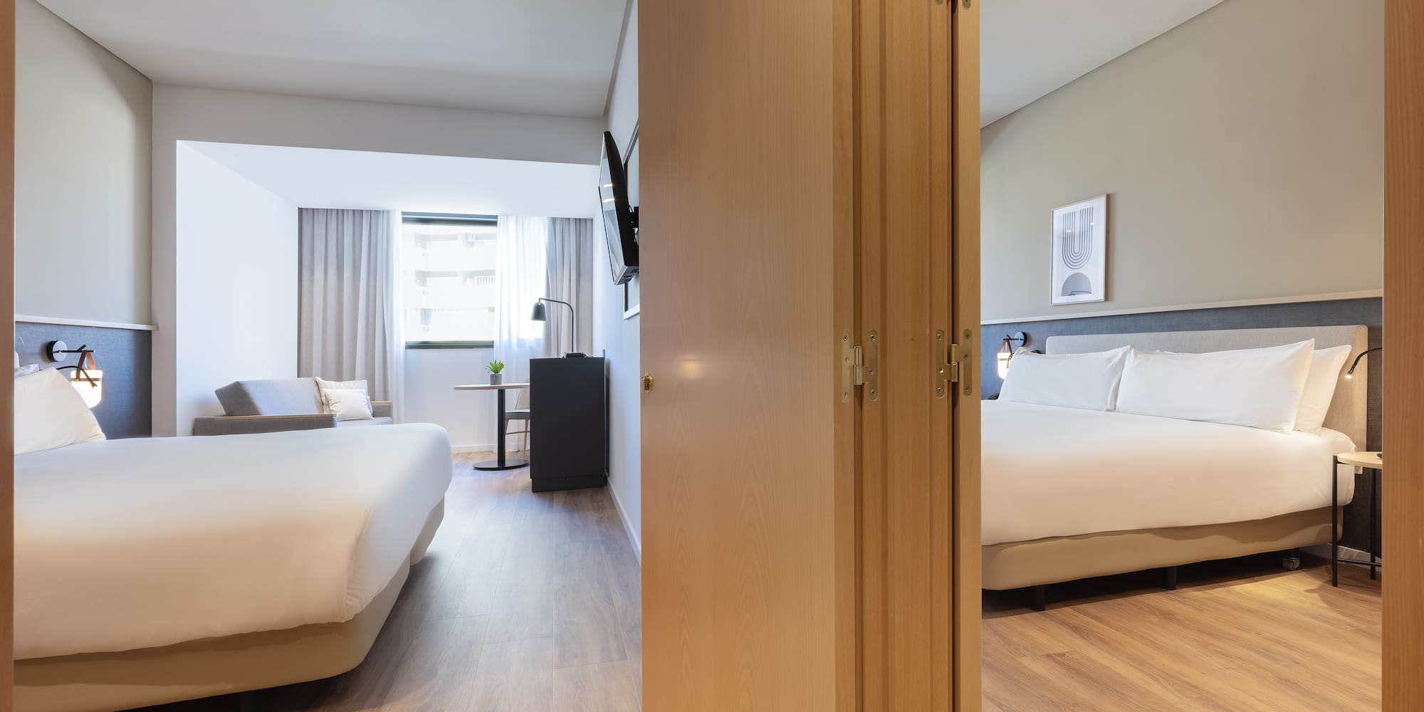 a room with a bed and a door open