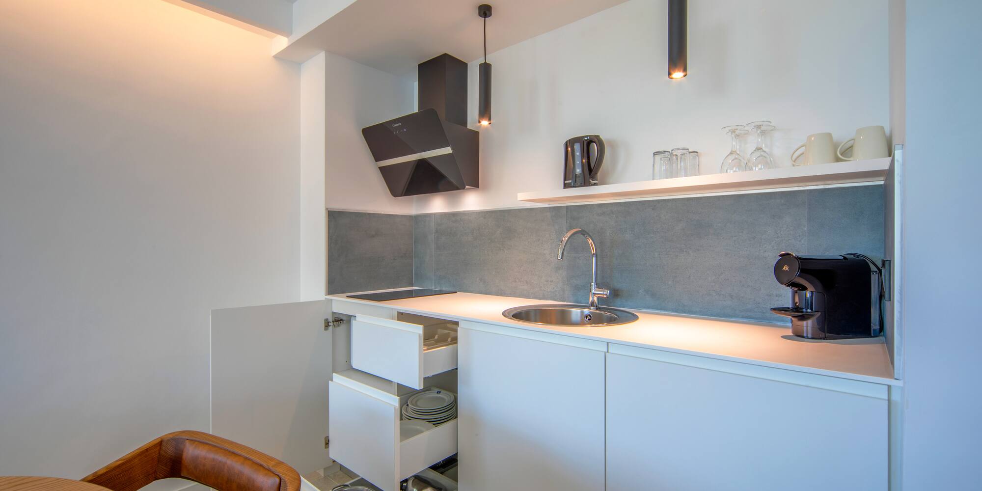 a kitchen with a sink and a counter