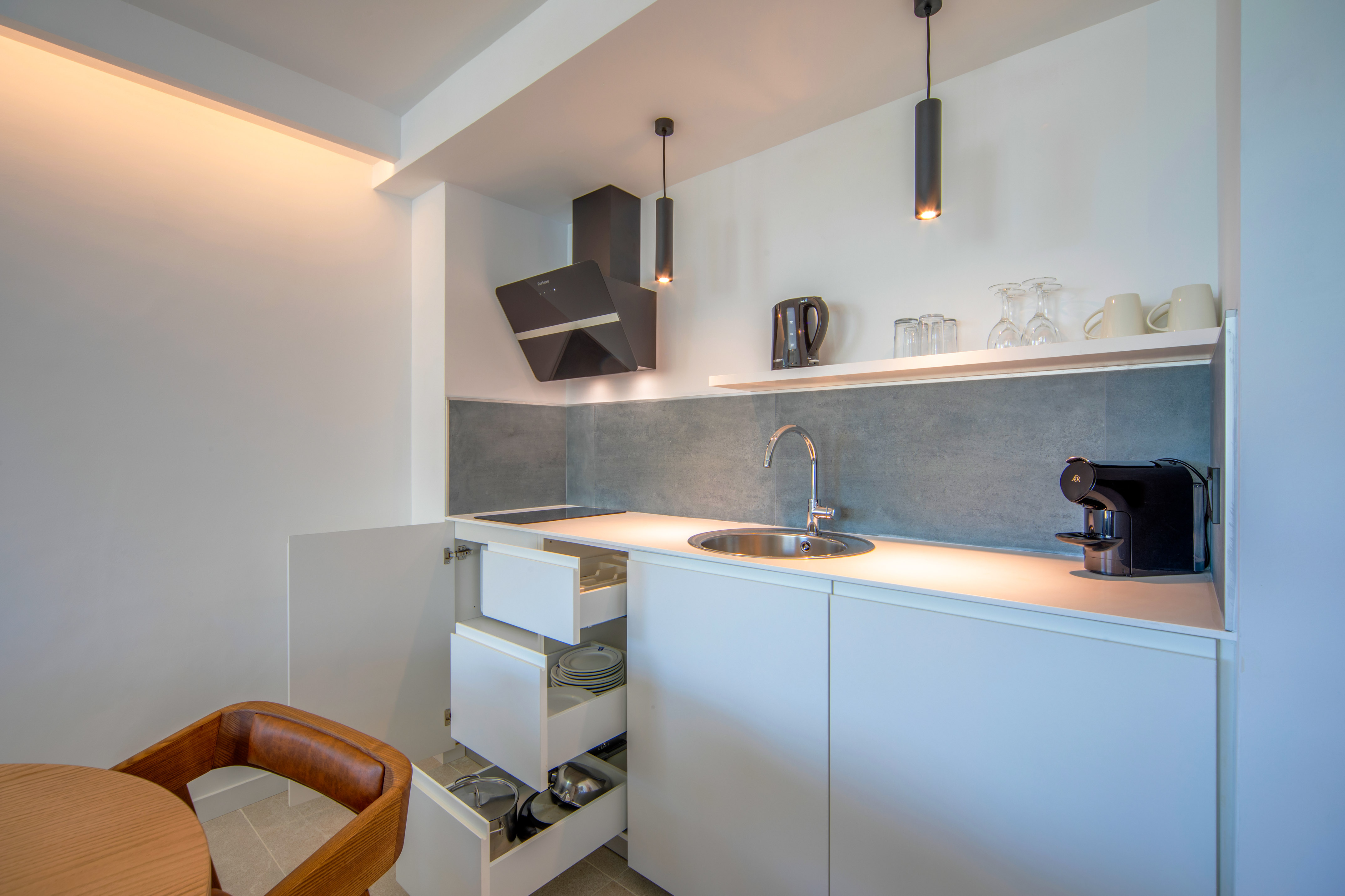 a kitchen with a sink and a counter