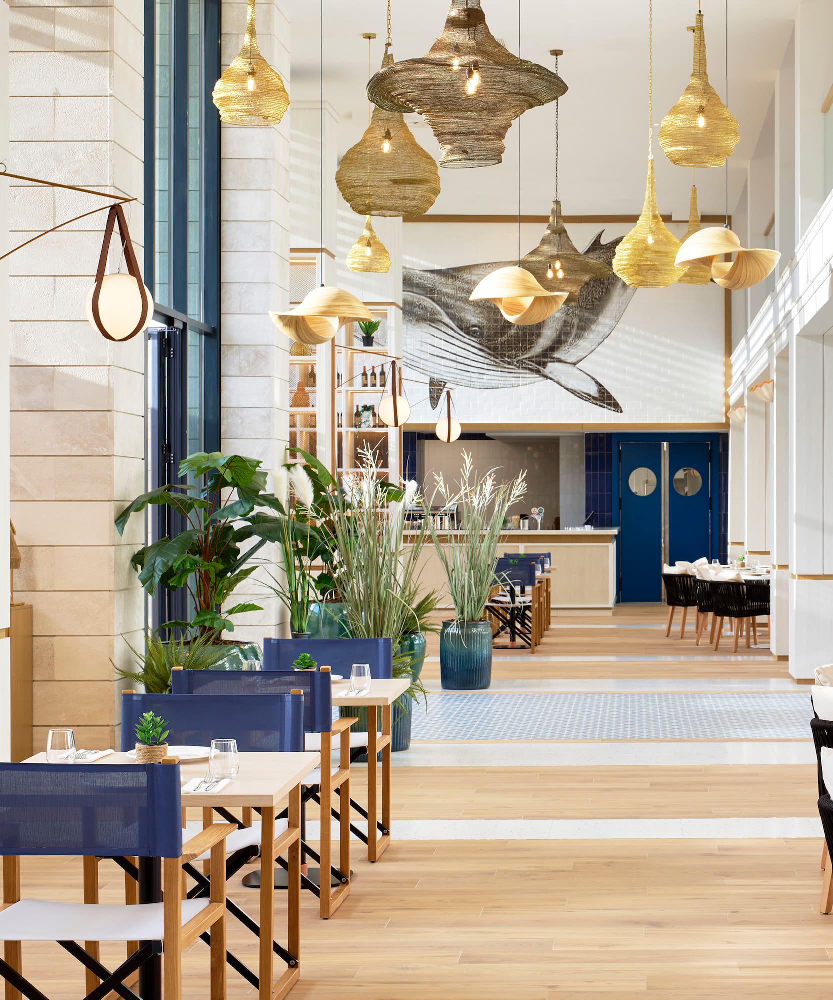 a restaurant with tables and chairs