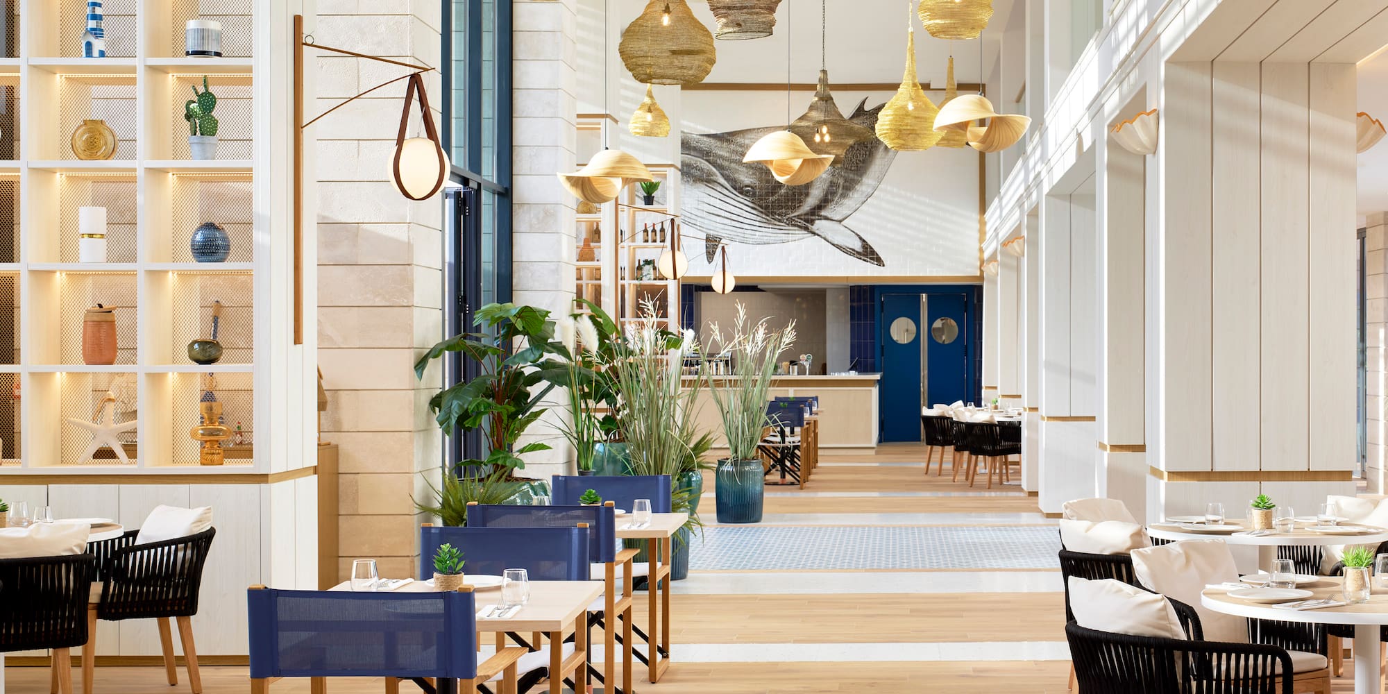 a restaurant with tables and chairs