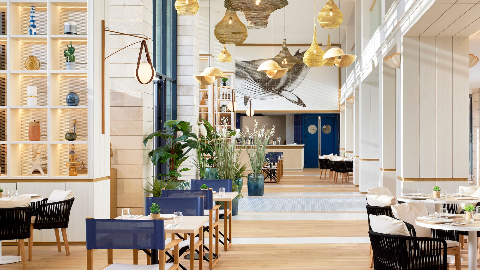 a restaurant with tables and chairs