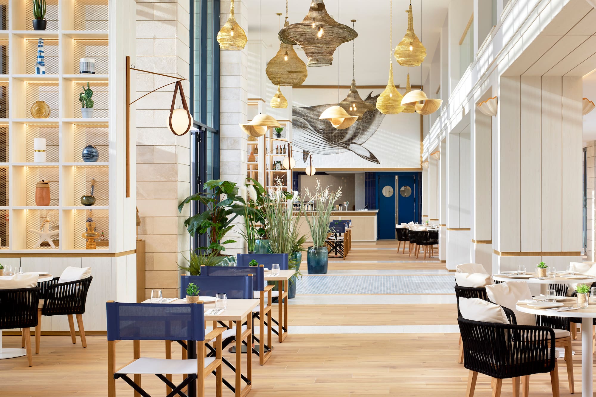 a restaurant with tables and chairs