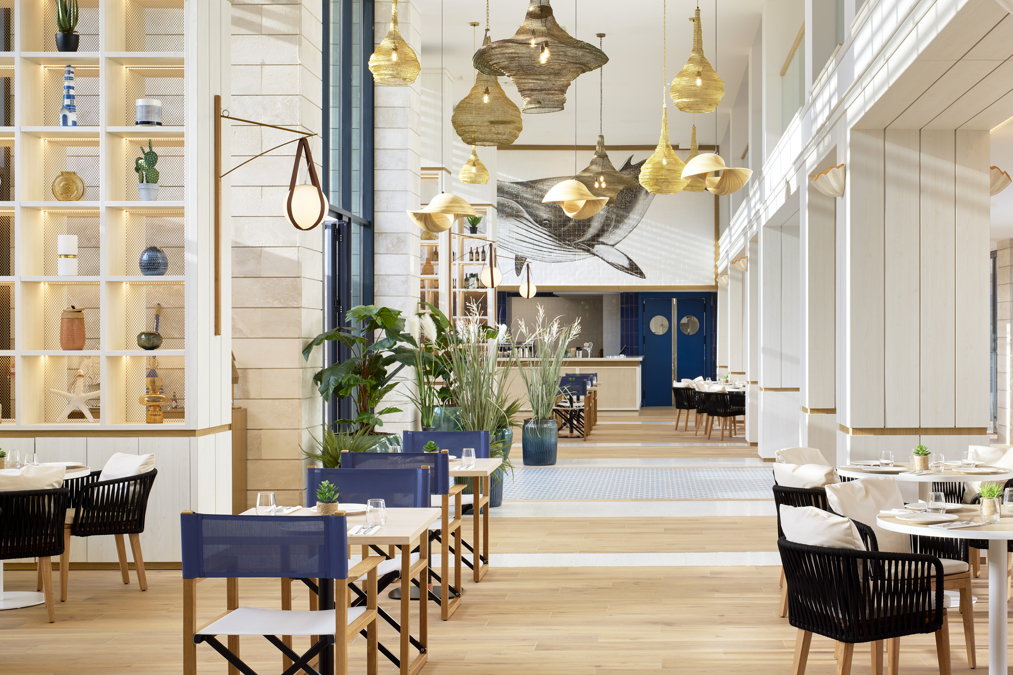 a restaurant with tables and chairs