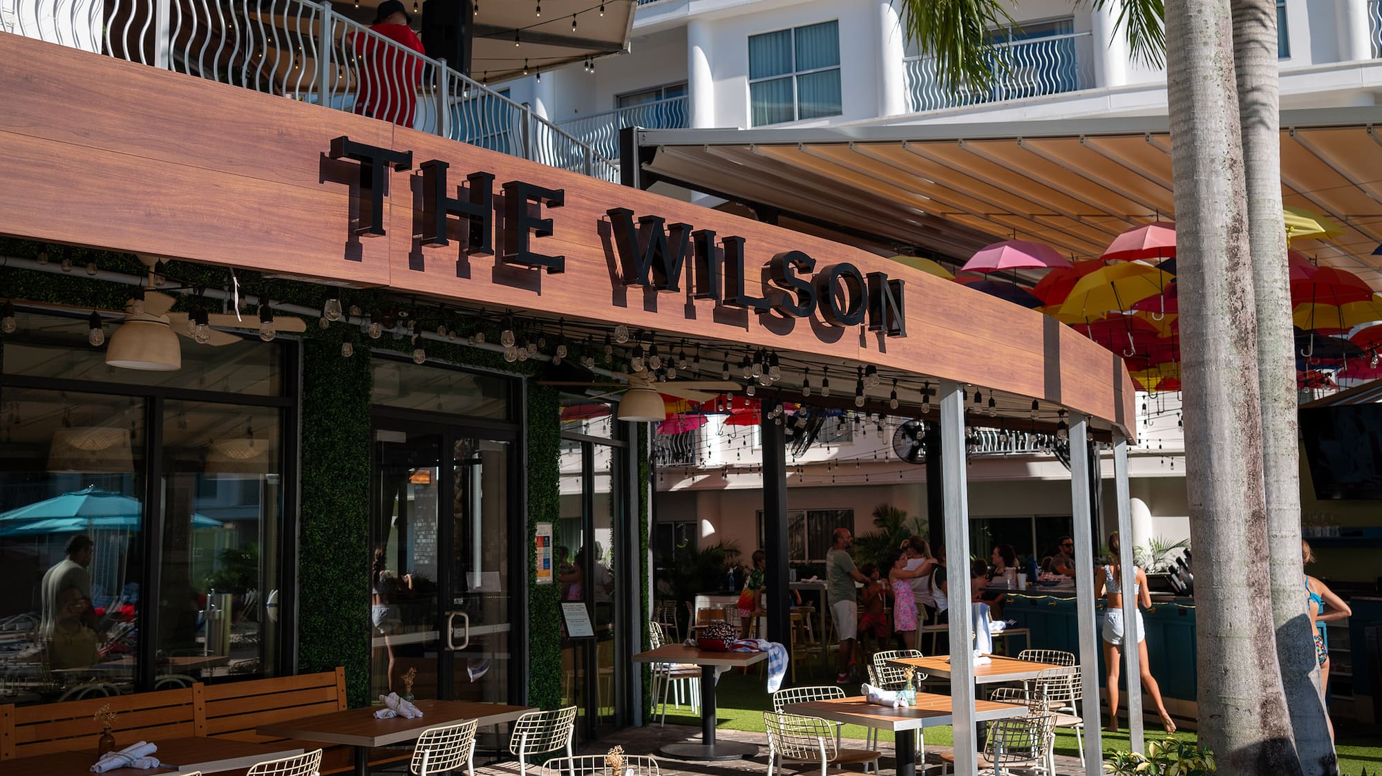 a restaurant with tables and chairs outside
