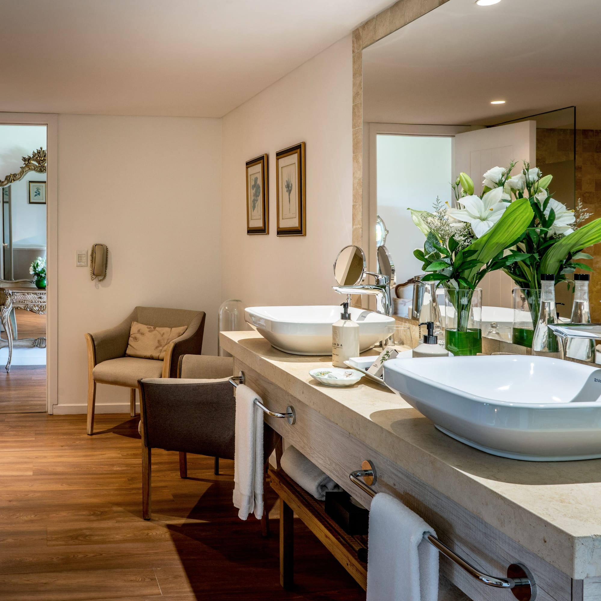 a bathroom with a large mirror and sink