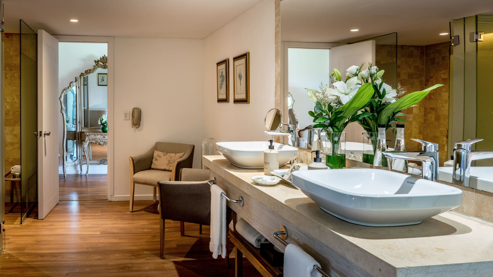 a bathroom with a large mirror and sink