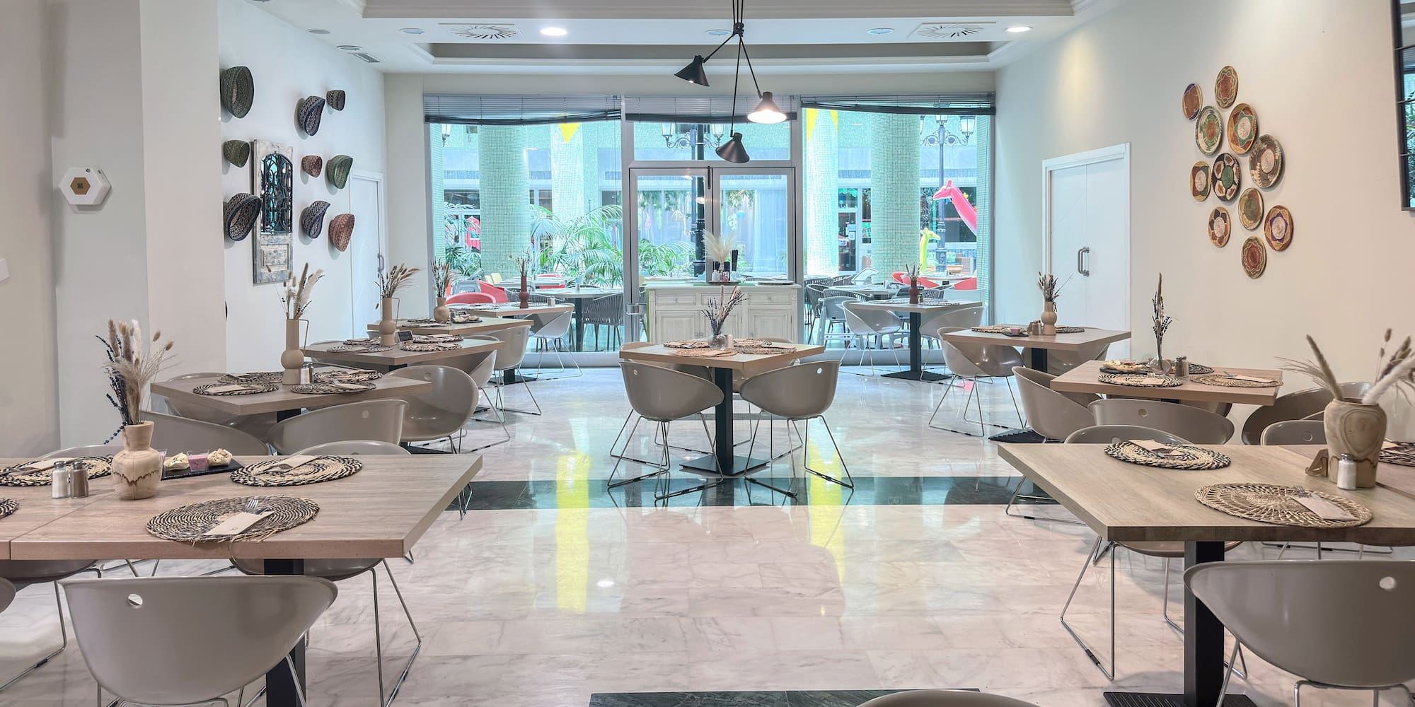 a room with tables and chairs