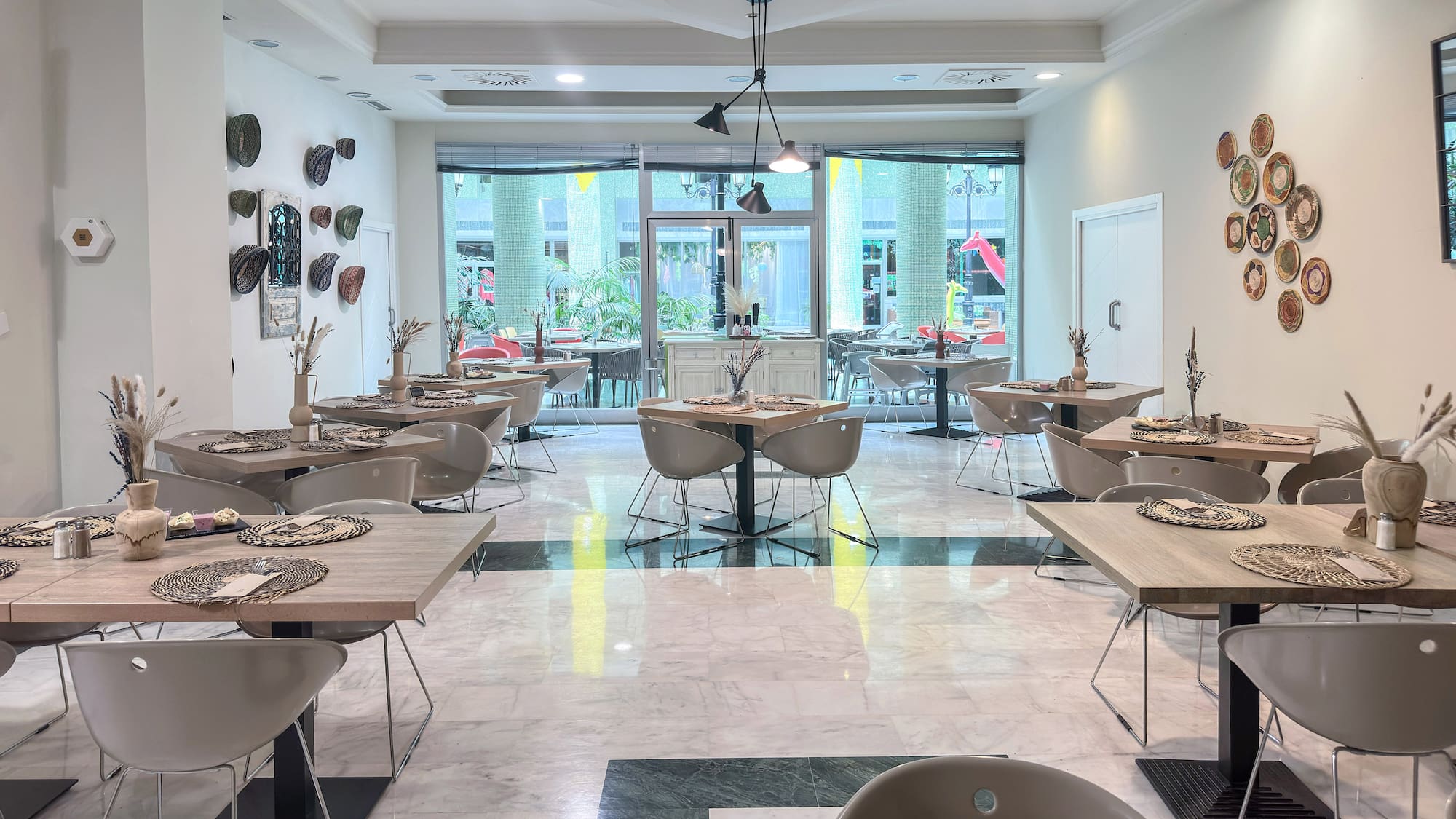 a room with tables and chairs