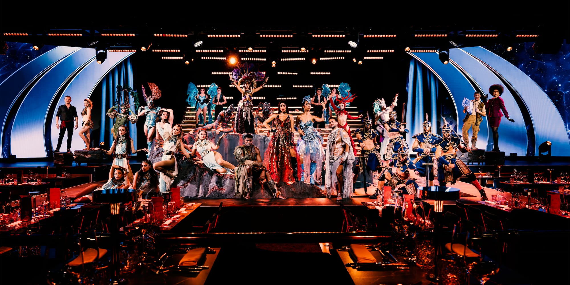 a group of people in clothing on a stage