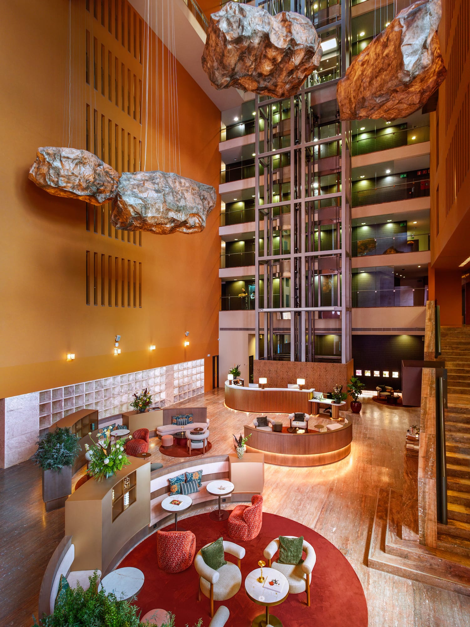 a lobby with a large rock ceiling