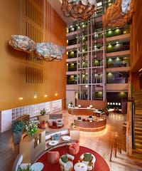 a lobby with a large rock ceiling