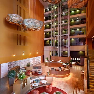 a lobby with a large rock ceiling