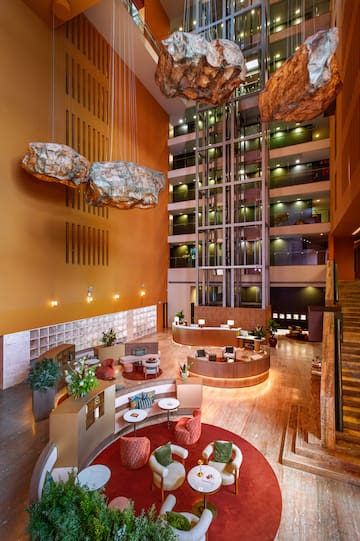 a lobby with a large rock ceiling