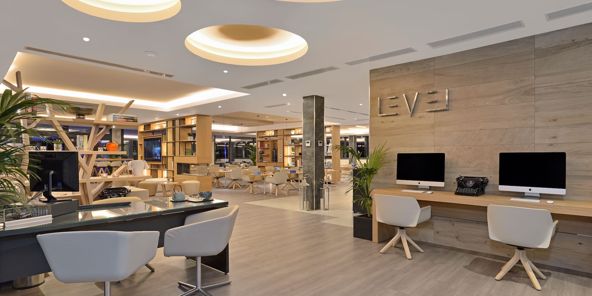 a room with a computer and a desk