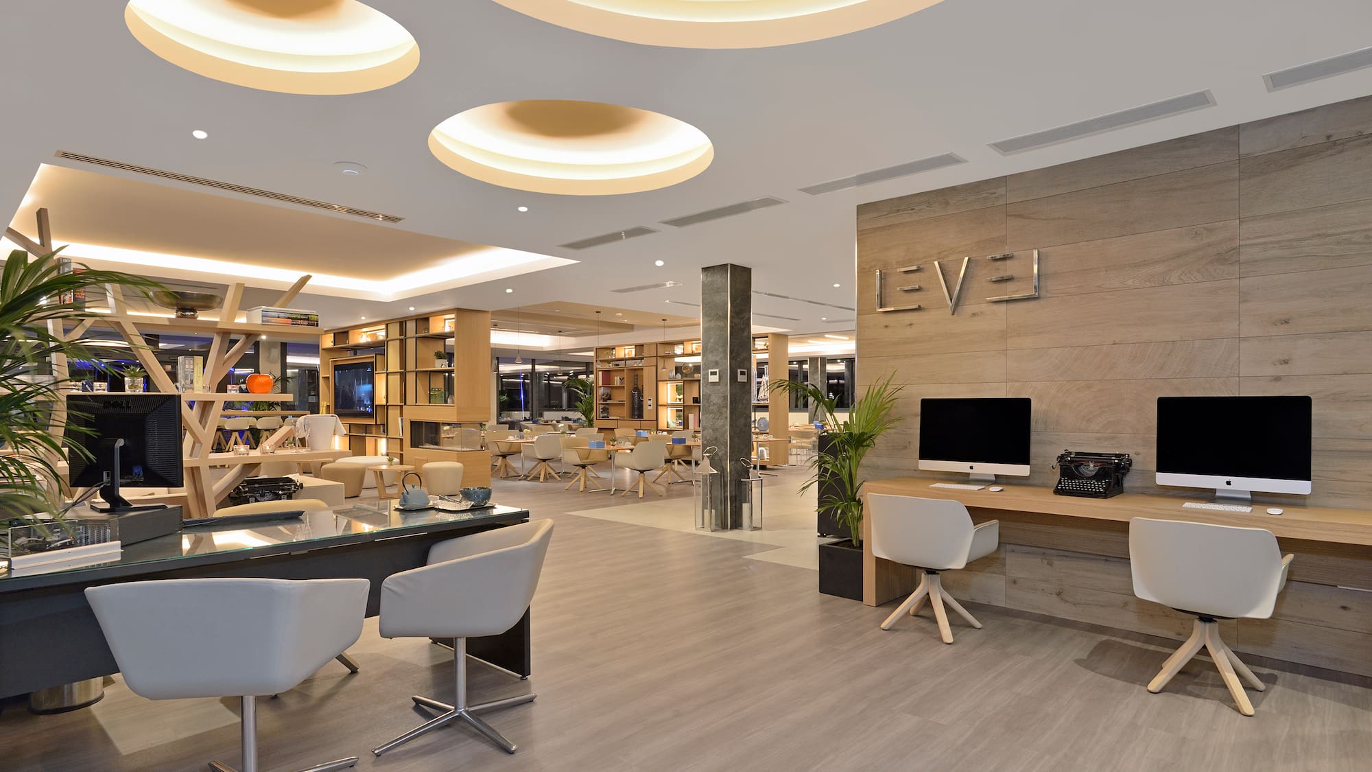 a room with a computer and a desk