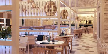 a room with tables and chairs